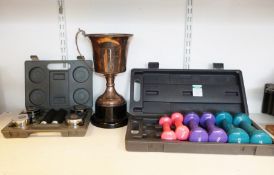 Set of One Body handweights, boxed, three pairs of dumbbells, boxed and a trophy