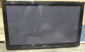 Very large Panasonic flatscreen television, 55 inch in a Samsung television 55