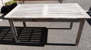 Teak garden table, 75cm high, 65 cm width, 151 cm in lengthCondition ReportRevised Measurements