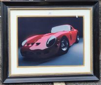 Colour print Ferrari, 73 x 86cm to include the frame, ebonised wood with gilt bubble slip