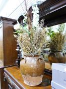 Large terracotta and treacle glazed pot