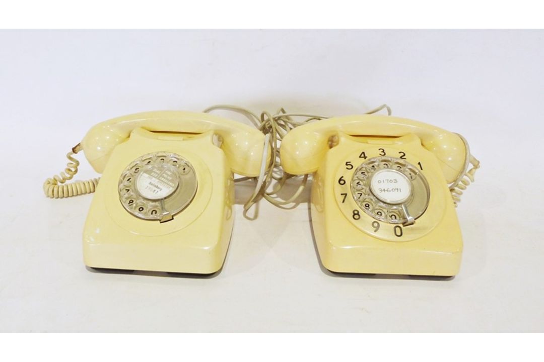 Pair of vintage cream-coloured telephones (2)