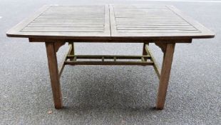 Wooden garden tableCondition ReportApprox. Dimensions 150 x 110 x 75cm Scratches throughout