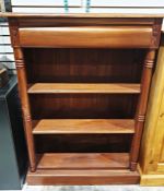 Modern open bookcase, the rectangular top with moulded edge, cushion drawer, three shelves, on