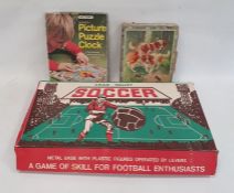 Chad Valley table soccer set, a Victory picture puzzle clock and a set of picture building blocks (