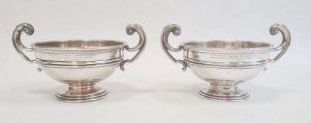 Pair of Edwardian two-handled pedestal silver bowls by A & J Zimmerman Ltd, Birmingham 1902, each of