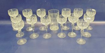 Set of fourteen Stuart cut glass hock glasses together with a glass vase