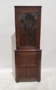 20th century oak corner display cupboard with leaded glazed door above cupboard door, on bracket
