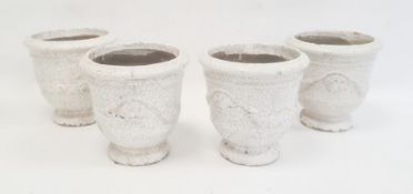 Set of four jardinieres with moulded swag decoration and craquelure white glaze, 17cm high.