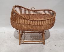 Wicker moses basket on stand