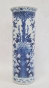 Chinese blue and white vase of cylindrical form decorated with a tree surrounded by flowers, birds