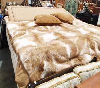 King sized divan bed and mattress with guanaco fur throw, headboard and cushions  Condition