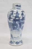 Chinese blue and white vase of baluster form decorated with pagodas and lake scene, within a