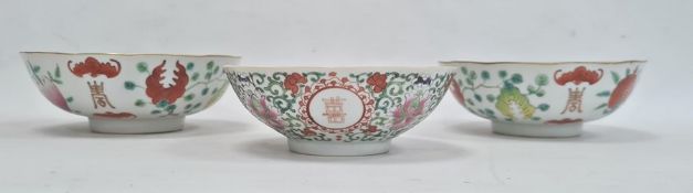 Pair of Chinese bowls, the exteriors with enamelled decoration of fruit, bats and character marks,