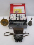 Cased mahjong set, a stellarscope (boxed) and a bell, and a pair Tourox 8x binoculars by J D Moeller