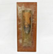 A modern bronze organic sculpture mounted on a hardwood base