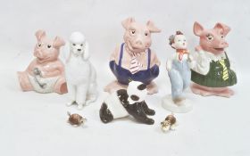 Collection of ceramic figures including Royal Dux, USSR (Lomonosov) and Wade Nat West pig money
