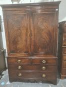 19th century converted linenpress with moulded cornice above two cupboard doors, the interior now