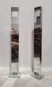 Pair of floor-standing lights in mirrored finish Condition Report Some marking to surface. No