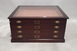 Modern plan chest with glazed top above four drawers, to plinth base,109.5cm x 55cm