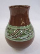 Holkham pottery vase, ovoid shaped, brown glaze with green band, marked to base, 18cm high