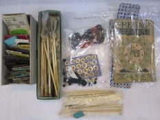 Bag of assorted sewing items, to include packets of needles, bone bodkins, rug weavers, bone crochet
