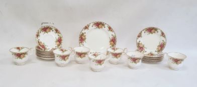 Quantity of Royal Albert 'Old Country Roses' tea wares comprising seven cups and saucers, seven side
