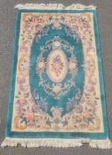 Chinese superwash green ground rug