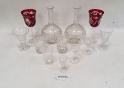 Pair of glass carafes of globular form with bands of cut decoration with a set of six tumblers and