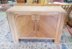 Early 20th century oak sideboard in the Art Deco taste two cupboard doors and an oak framed Art
