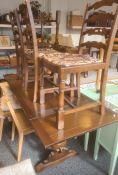 Oak extending table and four chairs (5)