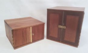 Two coin collector's cabinets each with a pair of doors enclosing assorted coin drawers (2)