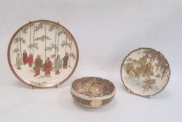 Japanese Satsuma plate depicting men in a bamboo forest, 21cm diameter, a Satsuma plate depicting
