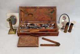 Wooden artist's box, the interior containing a folding travelling palette, tubes for oil paint,
