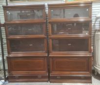 Pair of four-section Globe Wernicke mahogany and satinwood banded sectional bookcases with ivorine