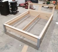 Modern bedroom suite including bedframe, two chests of three drawers, one bedside chest of two