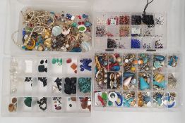 Assorted beads, jewellery pieces, earrings, clasps, rings, jewellery work items in sectioned