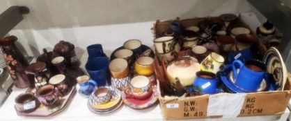 Large quantity of studio pottery including Watcombe and Motto ware, a dressing table set with floral