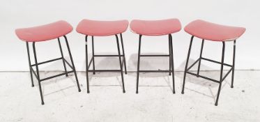 Four Kandya red seated metal framed stools (4)
