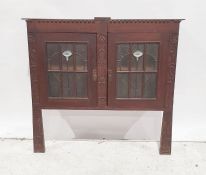 Art nouveau carved oak cabinet, part of larger original, pair leaded glazed doors with vaseline