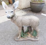 Stone garden statue of a fawn