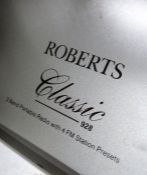 Phillips digital tuner and CD sound machine, two Roberts radios, a Matsui CD player