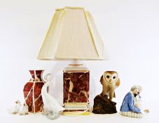 Nao model of a swan, two Nao models of ducklings, a sculpture of an owl, a modern ceramic table