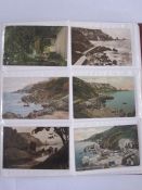 Early 20th century album of souvenir postcards including Torquay, Margate, Falmouth, a smaller album
