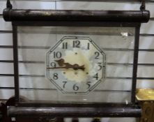Hanging clock with Arabic numerals to the glass dial