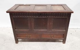 18th century-style oak mule chest with fluted decoration, lift top and two drawers under, on stile
