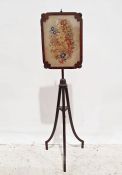 Mahogany framed needlework polescreen with needlework floral spray, reeded supports