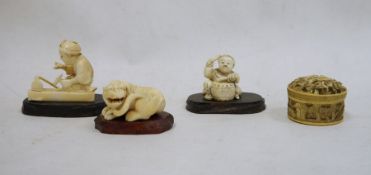 Japanese carved ivory okimono of a seated worker with hammer, signed to base, 4.5cm high, a Japanese