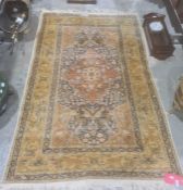Eastern silk rug, blue ground field decorated with various animals and flowers, red ground central