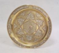 Middle Eastern brass dish of circular form with inlaid copper and silvered decoration, 24.5cm
